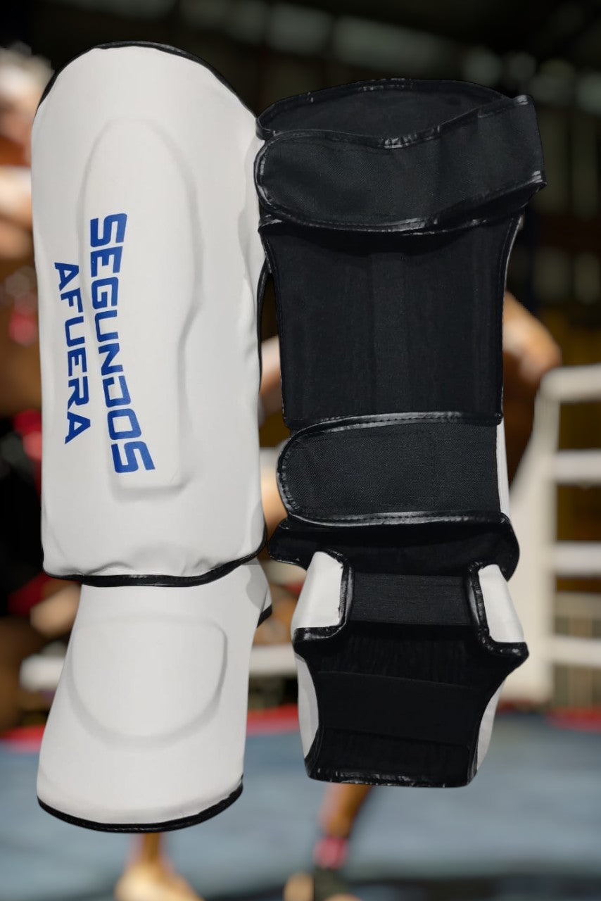 PROTECTOR DE TIBIA RIGIDO PROFESIONAL BLANCO Y AZUL