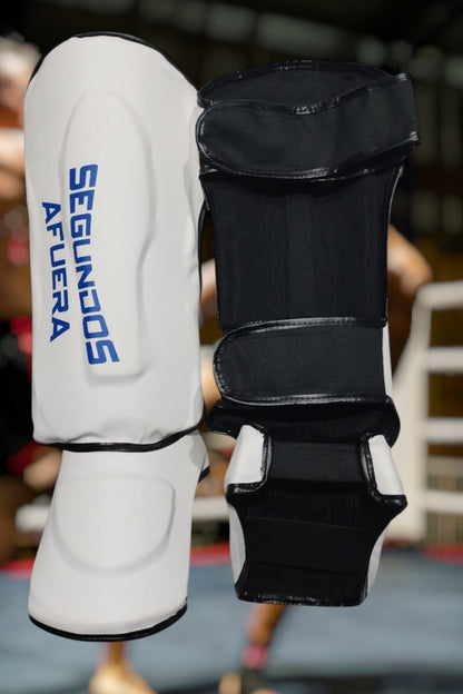 PROTECTOR DE TIBIA RIGIDO PROFESIONAL BLANCO Y AZUL