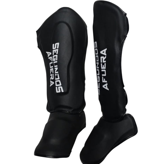 PROTECTOR DE TIBIA RIGIDO PROFESIONAL NEGRO
