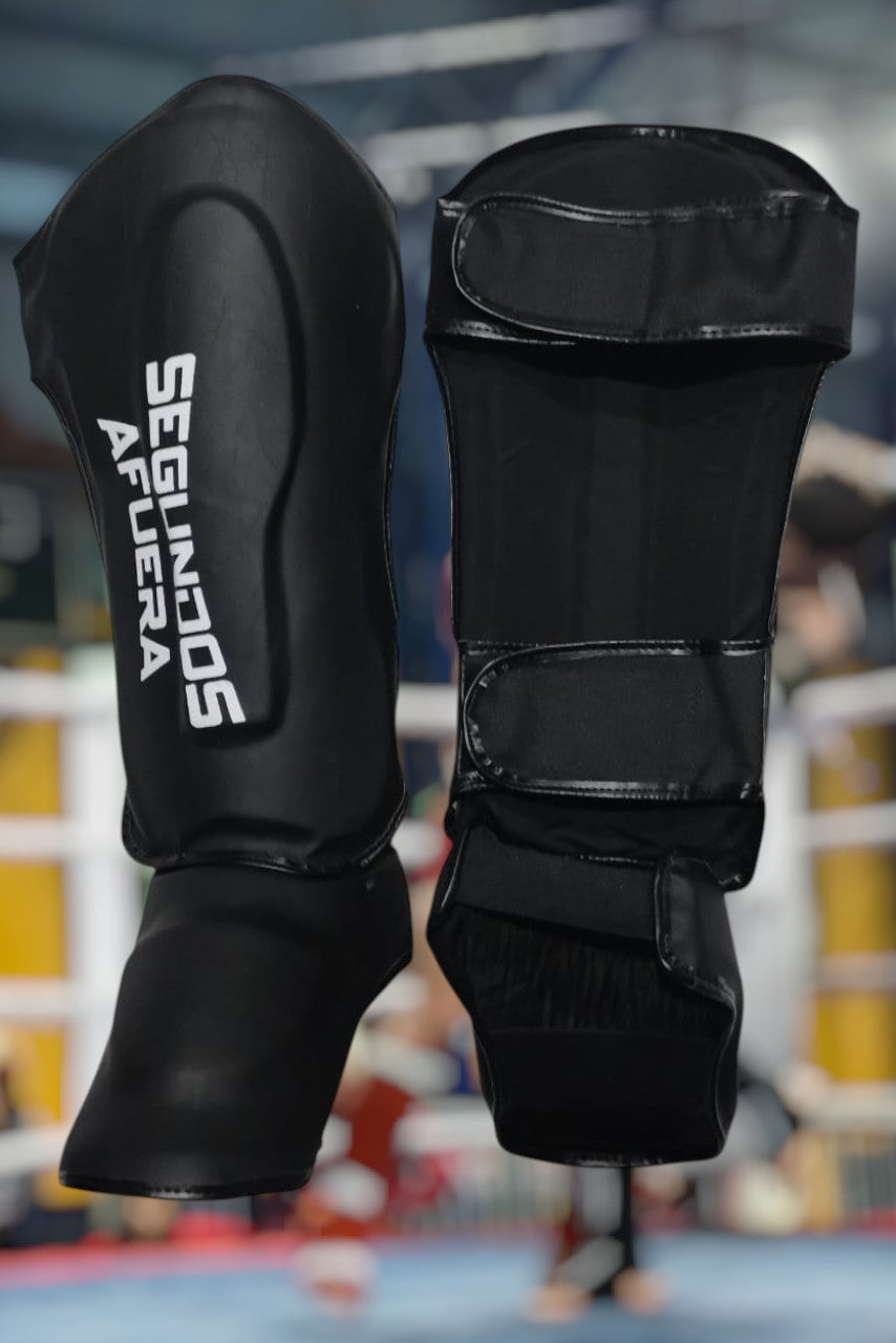 PROTECTOR DE TIBIA RIGIDO PROFESIONAL NEGRO