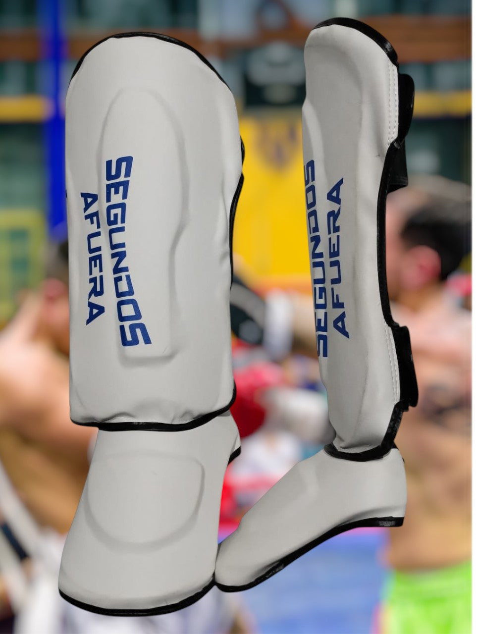 PROTECTOR DE TIBIA RIGIDO PROFESIONAL BLANCO Y AZUL