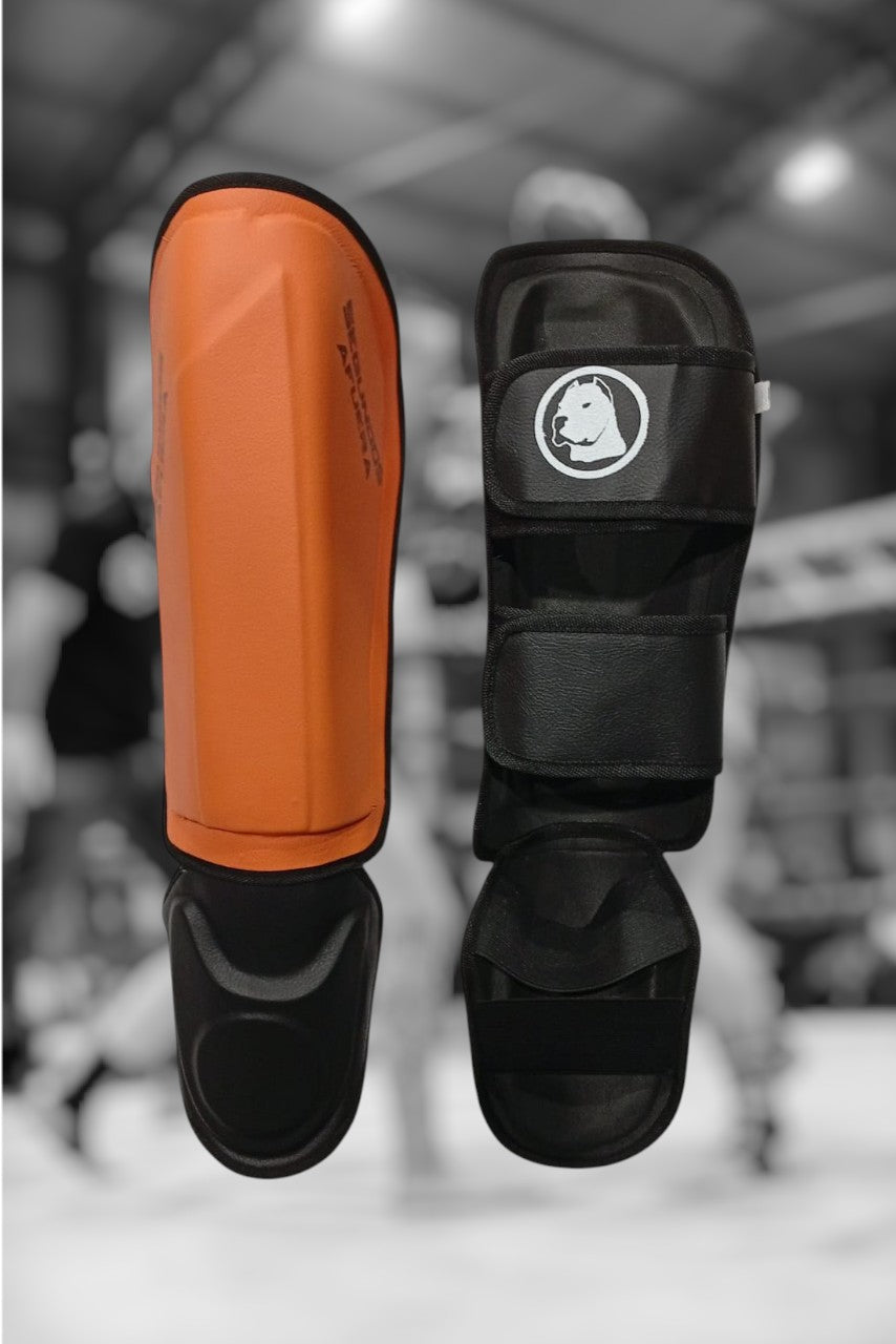 PROTECTOR DE TIBIA RIGIDO PROFESIONAL NARAJA.
 MODELO ESCARLATA.